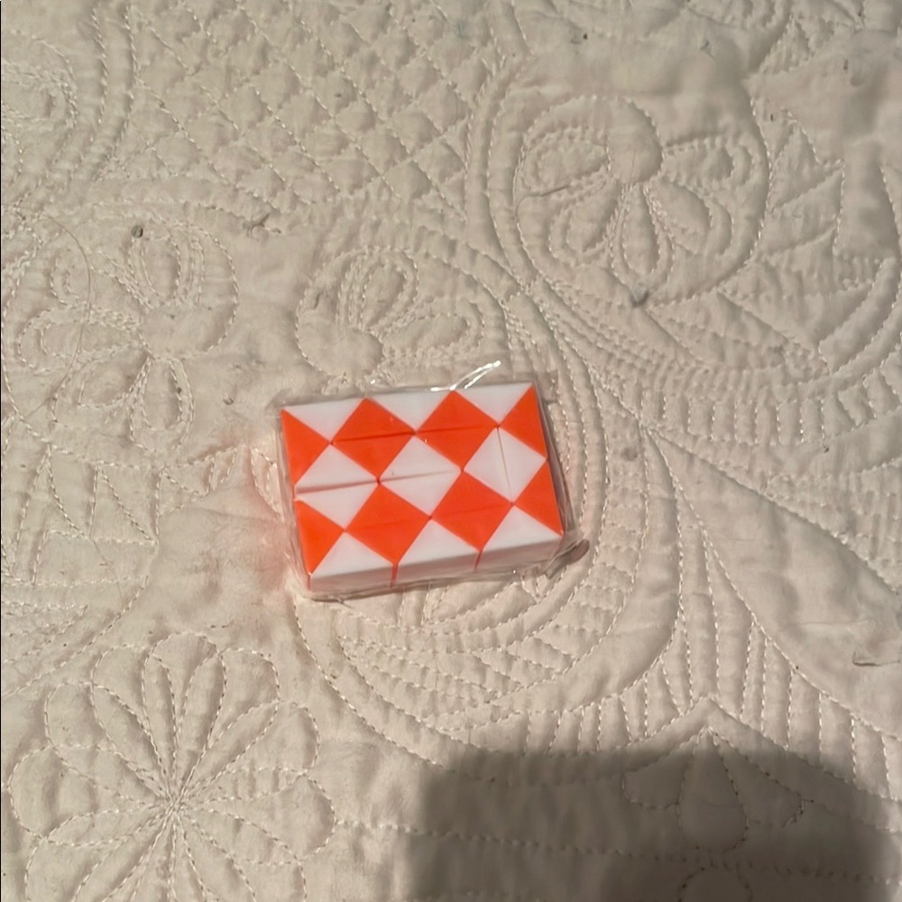 Orange and White Puzzle Toy